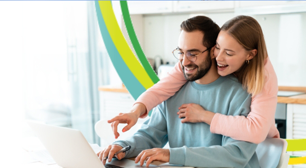 marriage couple looking for investments using a laptop